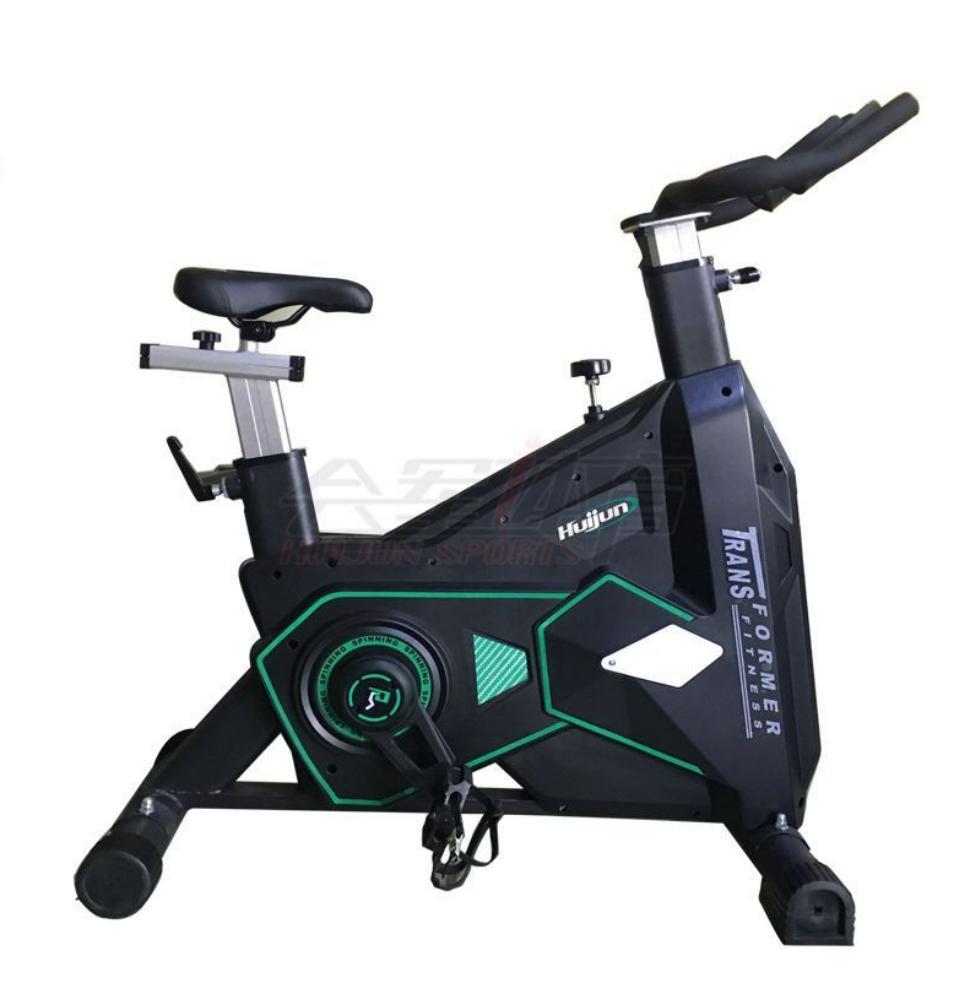 Black and green indoor cycling bike with adjustable features, labeled Huijun Transformer Fitness.